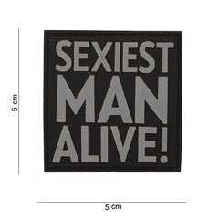 Embleem 3D PVC Sexiest Man Alive Gri - Afirmă-ți Identitatea Tactică