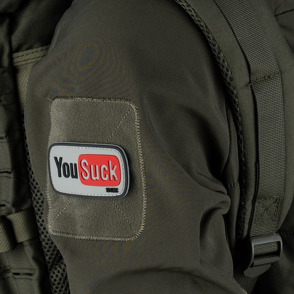 Embleem 3D PVC "You Suck" Alb/Negru - Atitudine Fără Compromis