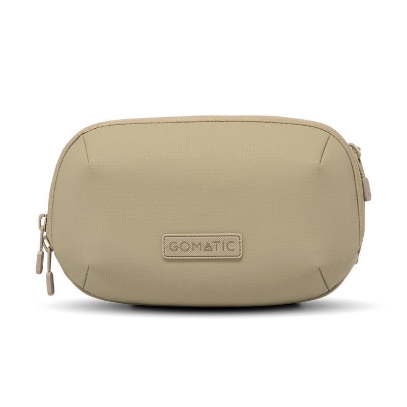 Geantă Sling Gomatic NAVIGATOR RS 1L Sand GOMATIC - Poliester, Rezistentă la apă, Modulară