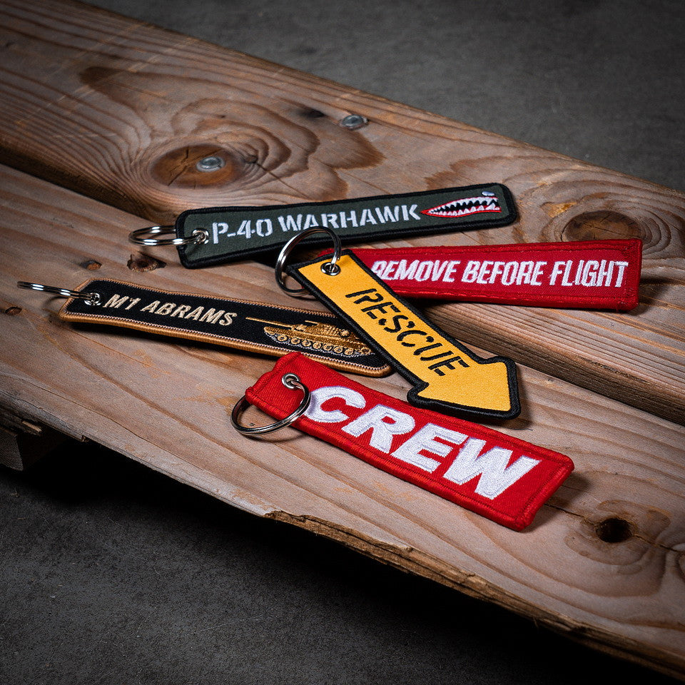 Sleutelhanger Remove Before Flight (2-zijdes) Diverse - Mesaj Iconic de Pregătire